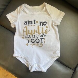 White and Gold Baby Onesie from auntie